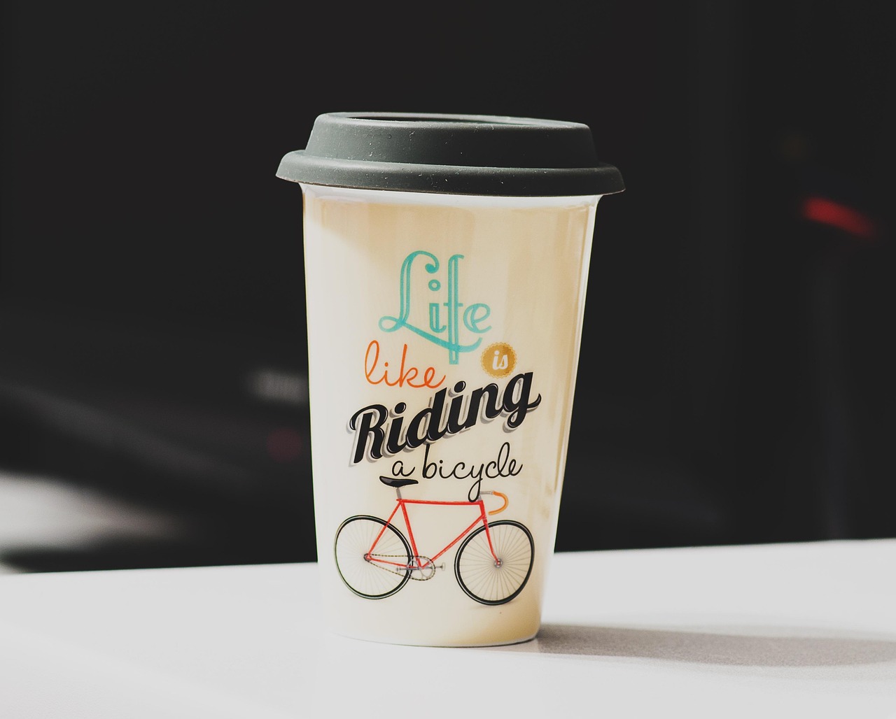A stack of kraft paper coffee cups